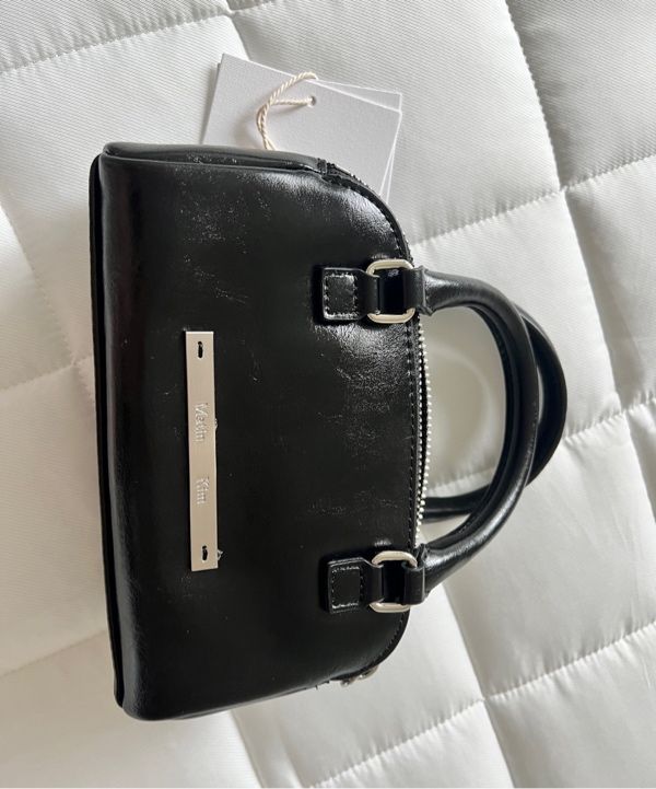 MUSINSA公式 | MATIN KIM DOUBLE ZIPPER MINI CROSS BAG IN WHITE