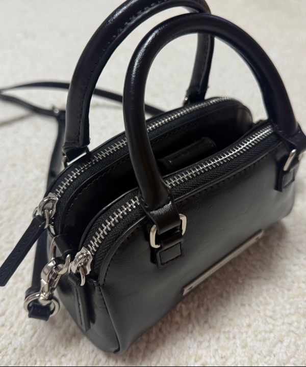 MUSINSA | MATIN KIM DOUBLE ZIPPER MINI CROSS BAG IN BLACK