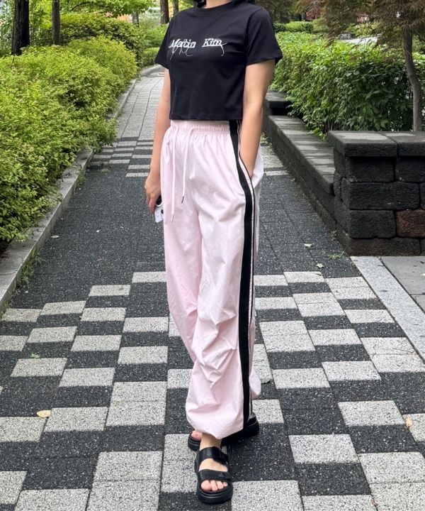 MUSINSA | MATIN KIM LOGO THREAD POINT CROP TOP IN BLACK