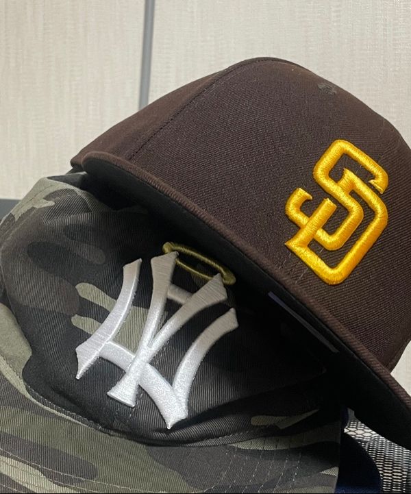 MUSINSA | AEAE AE SYMBOL ANGEL WING CAP [CAMO]