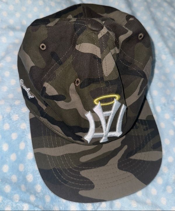 MUSINSA公式 | AEAE AE SYMBOL ANGEL WING CAP [CAMO]