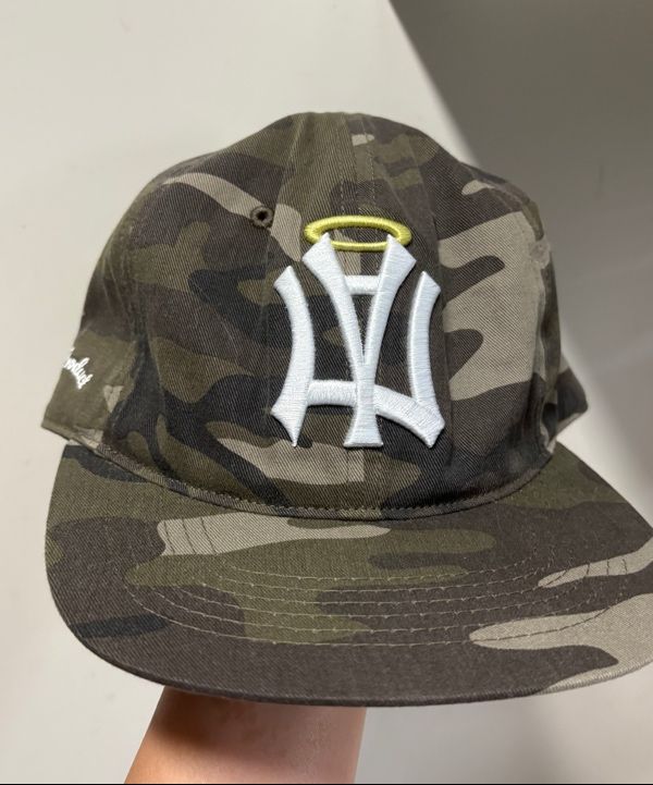 MUSINSA公式 | AEAE AE SYMBOL ANGEL WING CAP [CAMO]