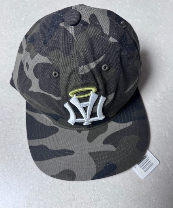 MUSINSA | AEAE AE SYMBOL ANGEL WING CAP [CAMO]