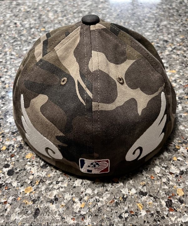 MUSINSA | AEAE AE SYMBOL ANGEL WING CAP [CAMO]