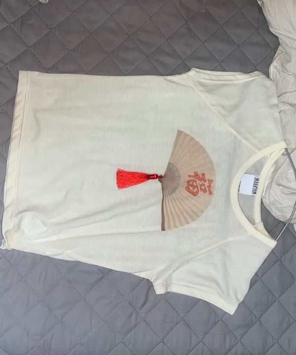 MUSINSA公式 | SCULPTOR Zen Tassel Tee Butter