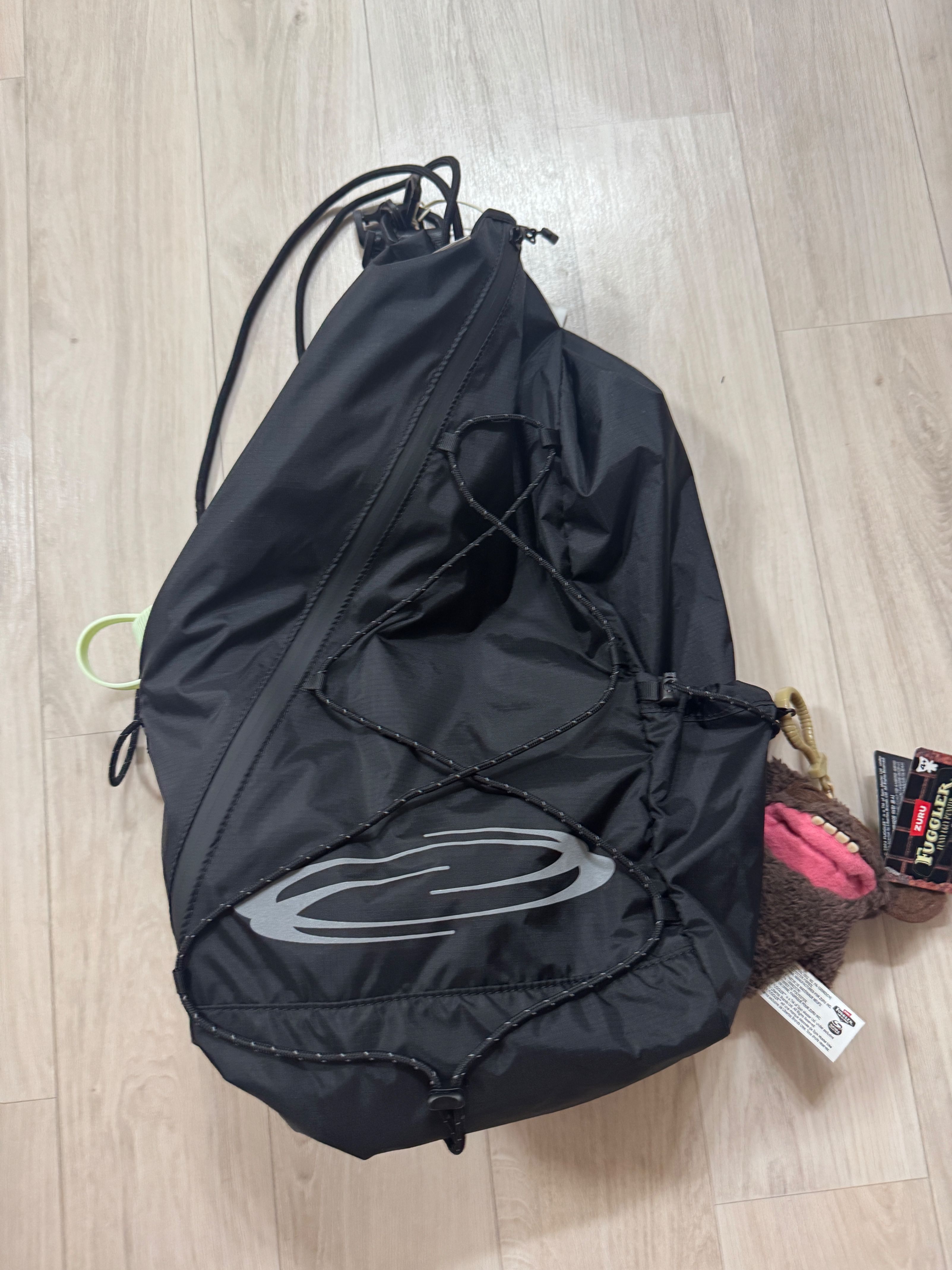 ★2025SS★OPENING PROJECT★Cross Zip Mesh Pocket String Bag MUSINSA | OPENING PROJECT Cross Zip Mesh Pocket String Bag