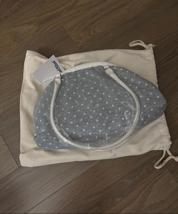MUSINSA | BADBLUE Dot Cozy Dumpling Bag Gray