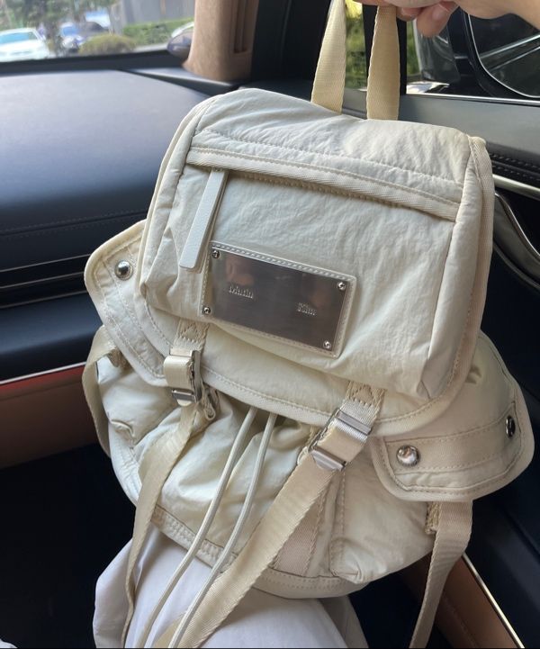 MUSINSA | MATIN KIM POCKET UTILITY SMALL BACK PACK IN LIGHT BEIGE