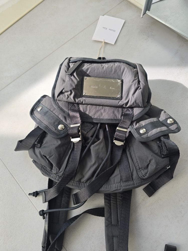 MUSINSA | MATIN KIM POCKET UTILITY SMALL BACK PACK IN CHARCOAL