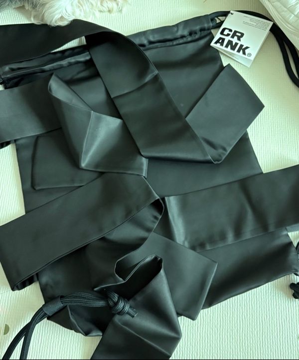 MUSINSA公式 | CRANK ダブルリボンタイドストリングバッグ_ブラック