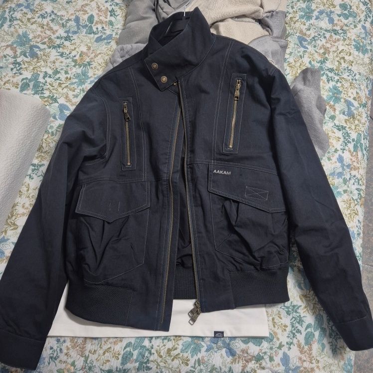 MUSINSA | AAKAM Zippered High Neck Jacket (Black)