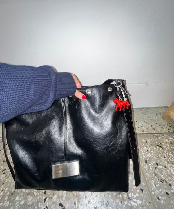 MUSINSA | MATIN KIM MATIN STUD POINT LARGE SHOULDER BAG IN BLACK