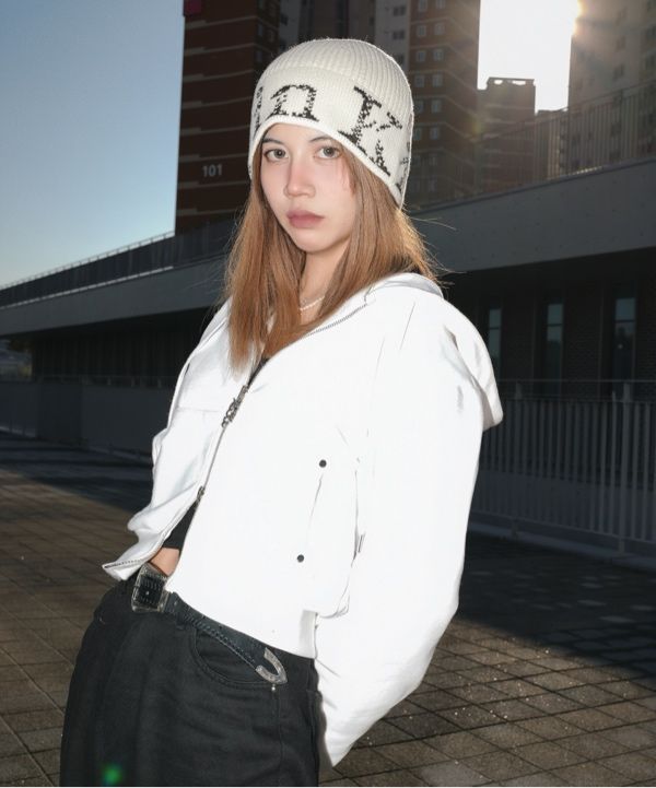 MUSINSA | MATIN KIM CRACKED LOGO BUCKET BEANIE IN IVORY