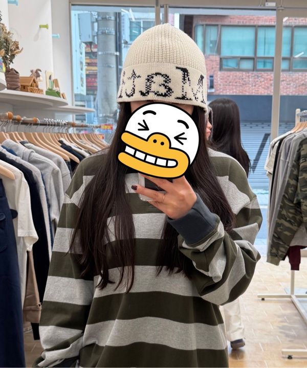 MUSINSA | MATIN KIM CRACKED LOGO BUCKET BEANIE IN IVORY