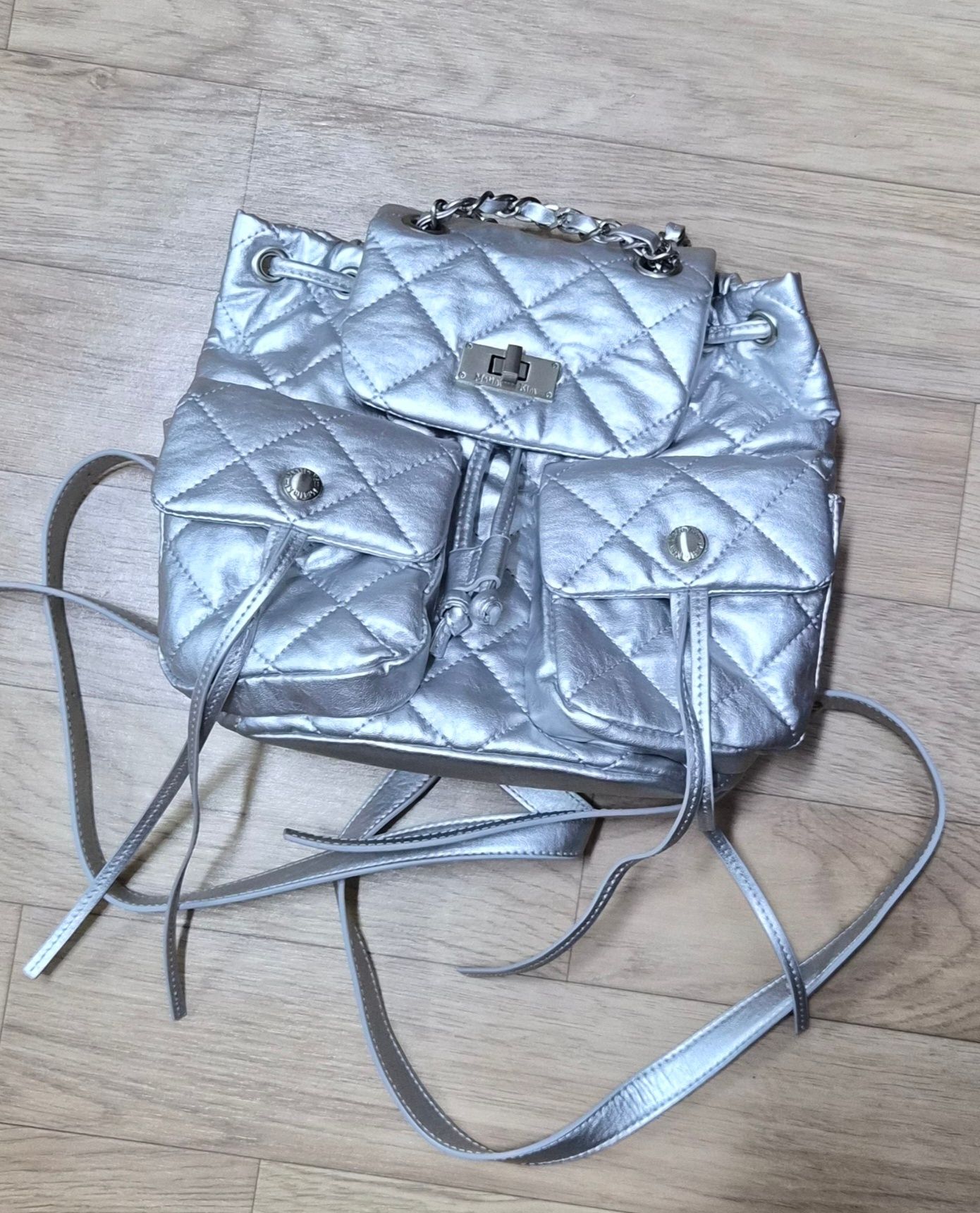 MUSINSA | MATIN KIM DOUBLE POCKET QUILTING MINI BACKPACK IN SILVER