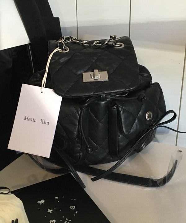 MUSINSA | MATIN KIM DOUBLE POCKET QUILTING MINI BACKPACK IN BLACK