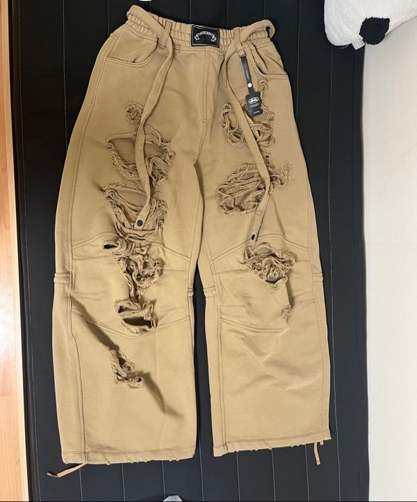 MUSINSA | BADBLOOD Destroyed Raw-Edge Joggers - Dark Tan