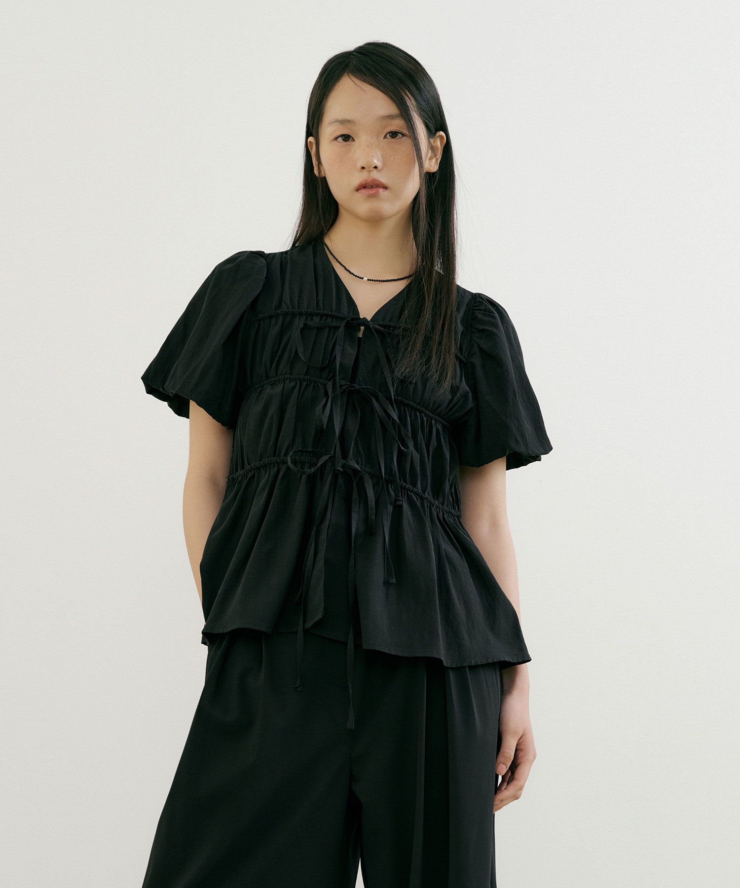 MUSINSA | LUCIR ZU Ella String Blouse (black)