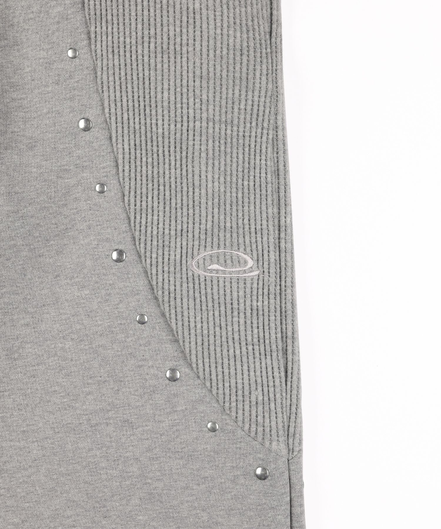 MUSINSA | NASTYKICK Waffle Stud Sweatpants (Melange) K25QC692