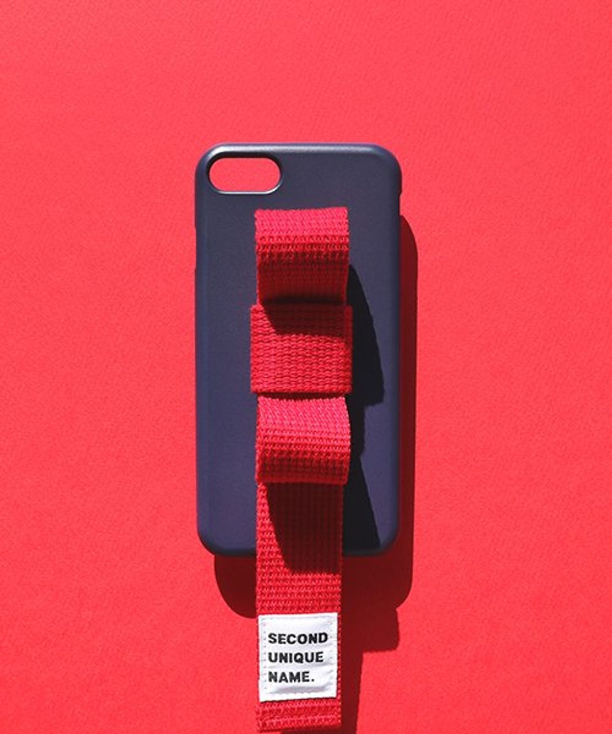 세컨드유니크네임(SECOND UNIQUE NAME) SUN CASE RIBBON NAVY RED