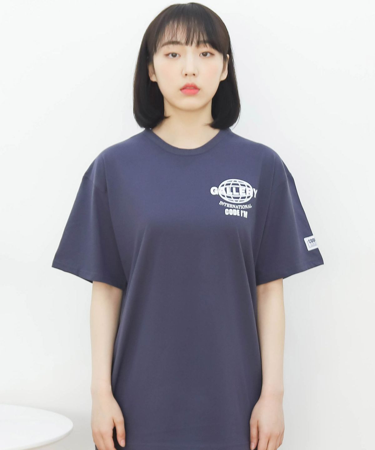 코드아이엠(CODE I'M) 30수 싱글 지구 로고 프린트 오버핏 반팔티 네이비