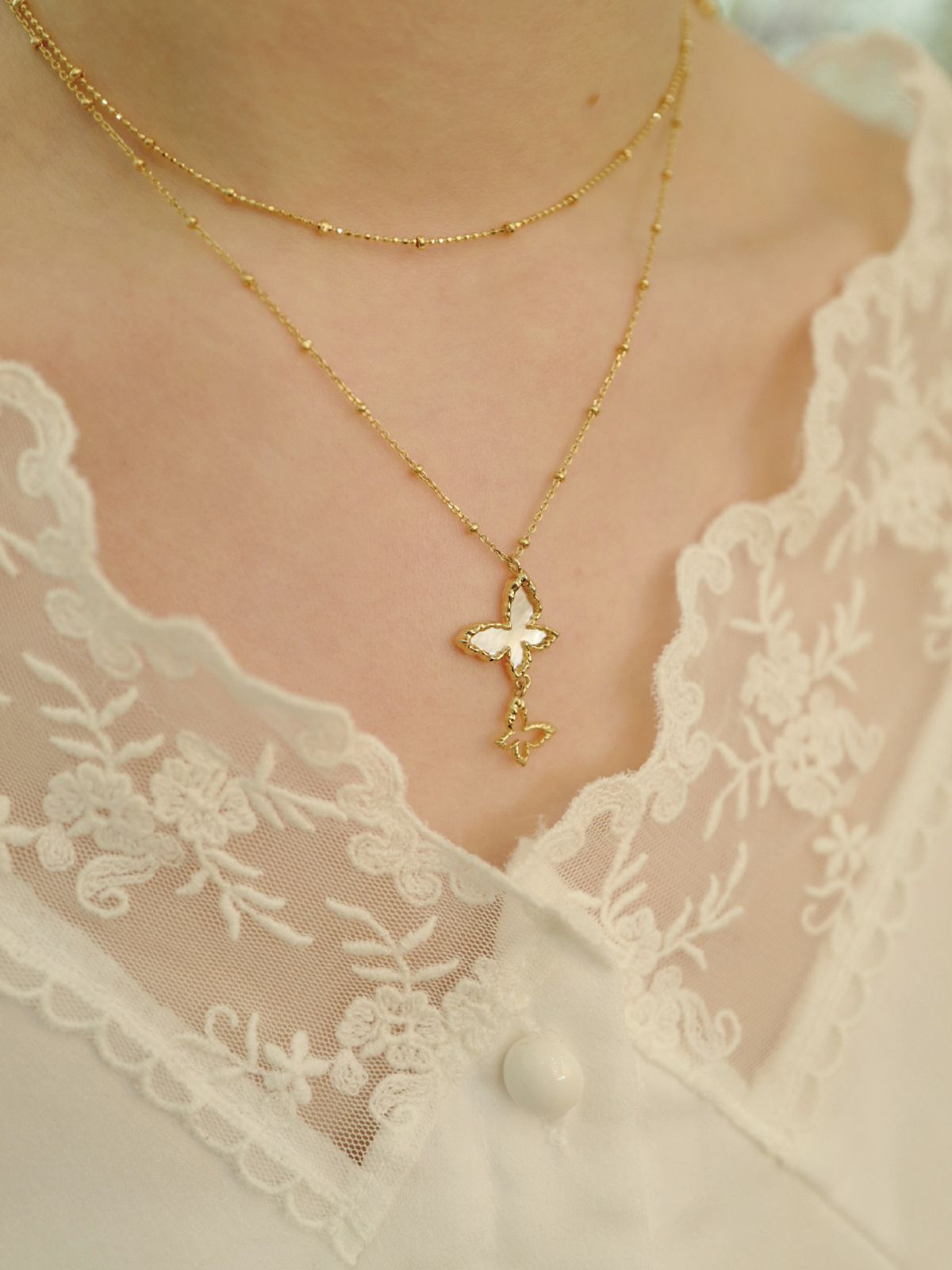 피오레(FIORE) nacre fleur wing necklace