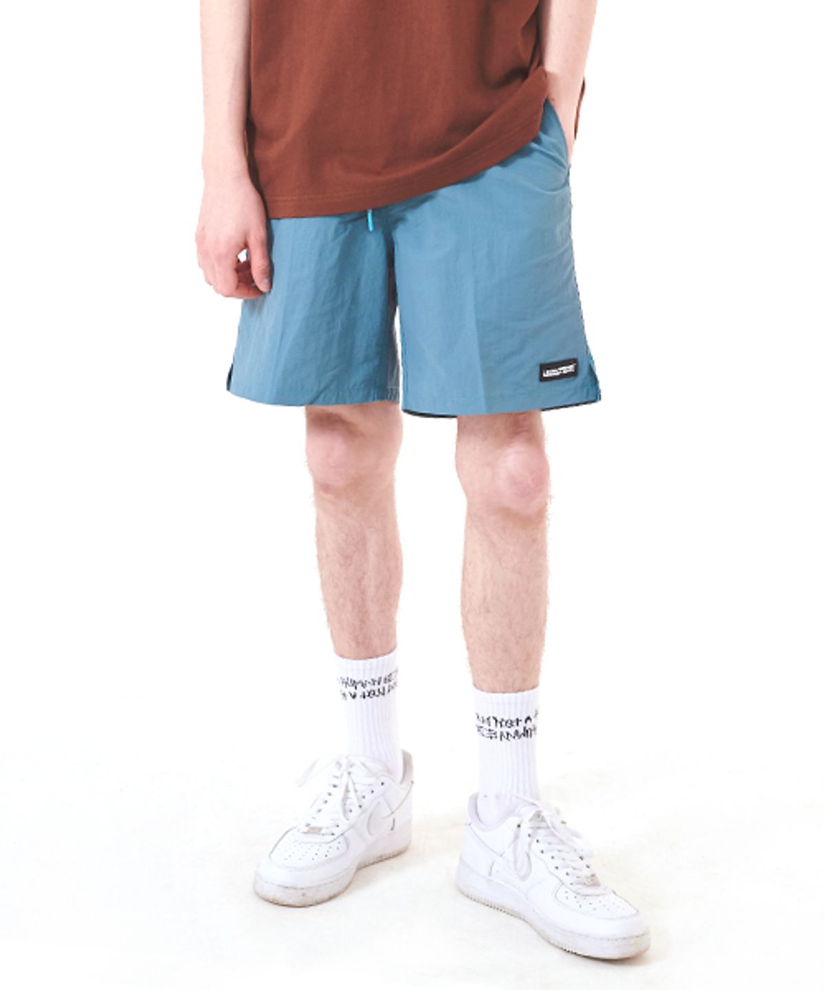아임낫어휴먼비잉(I AM NOT A HUMAN BEING) RUBBER PATCHED SHORTS - GREEN