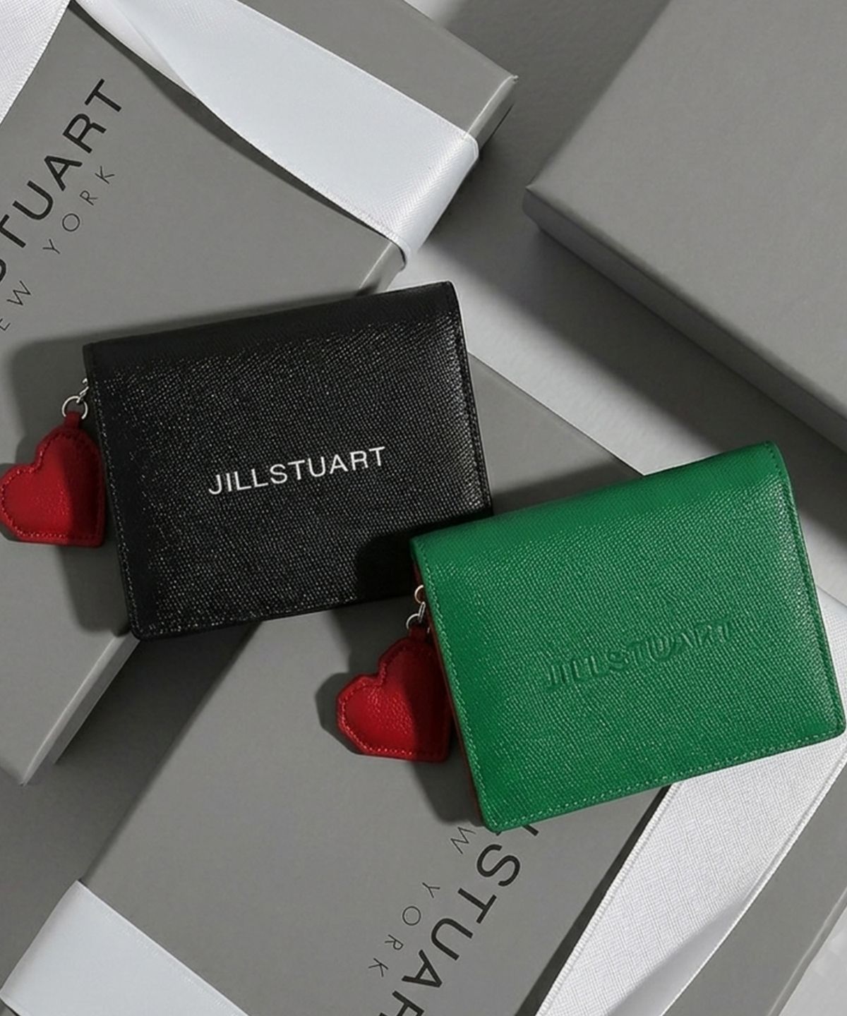 질스튜어트액세서리(JILLSTUART ACC) [PAPER] 로고 포인트 소가죽 2단 반지갑 2color