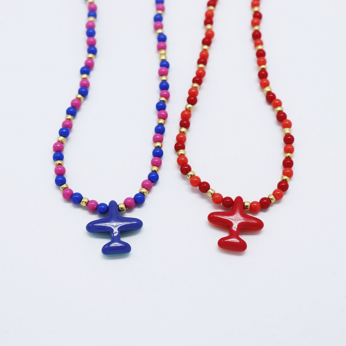 봉보(BONBEAU) Formica airplane colorball Necklace 호마이카 투톤컬러 비행기 비즈 목걸이