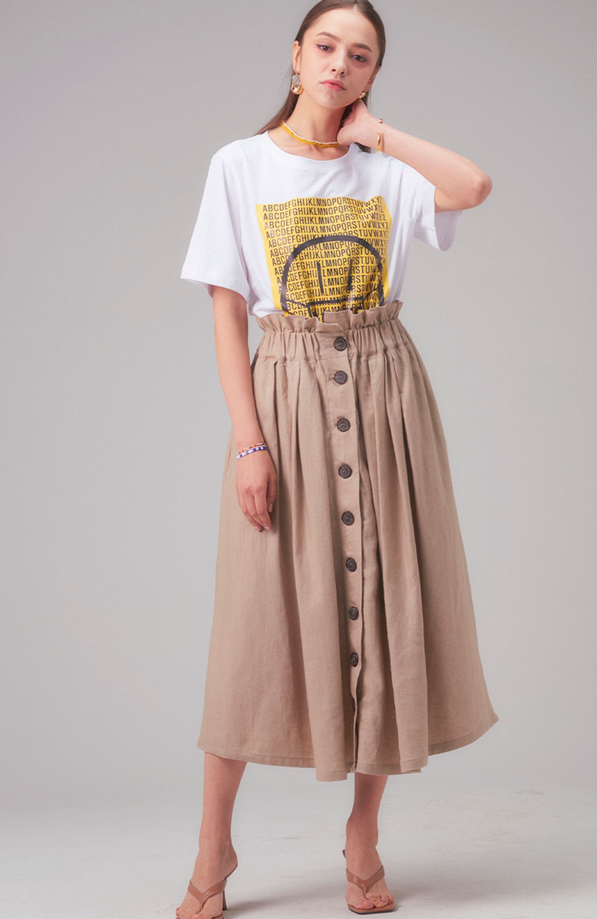 로희어패럴(ROHEE APPAREL) 버튼포인트 플리츠 스커트 / 베이지