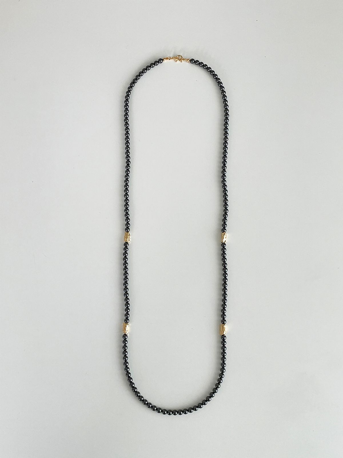 엘리오나(ELYONA) Sea Rock Single Layer Black Pearl Necklace