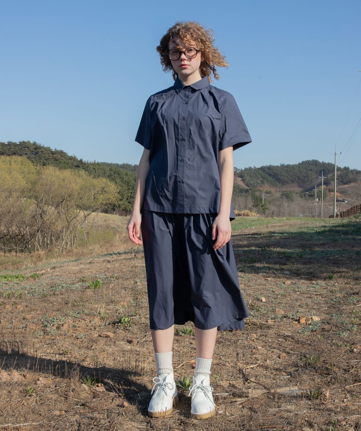버나드밀즈(BERNARD MILLS) OBLONG PLEATED SKIRT - NAVY