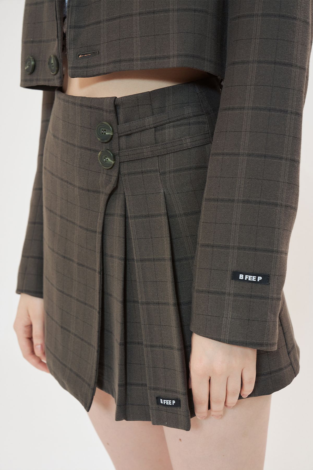 비피피(BFEEP) check setup skirt _khaki brown
