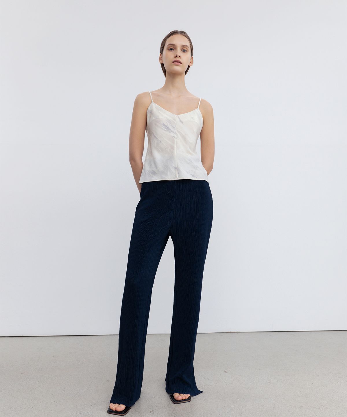 리이(RE RHEE) HIGH RISE PLEATED PANTS NA