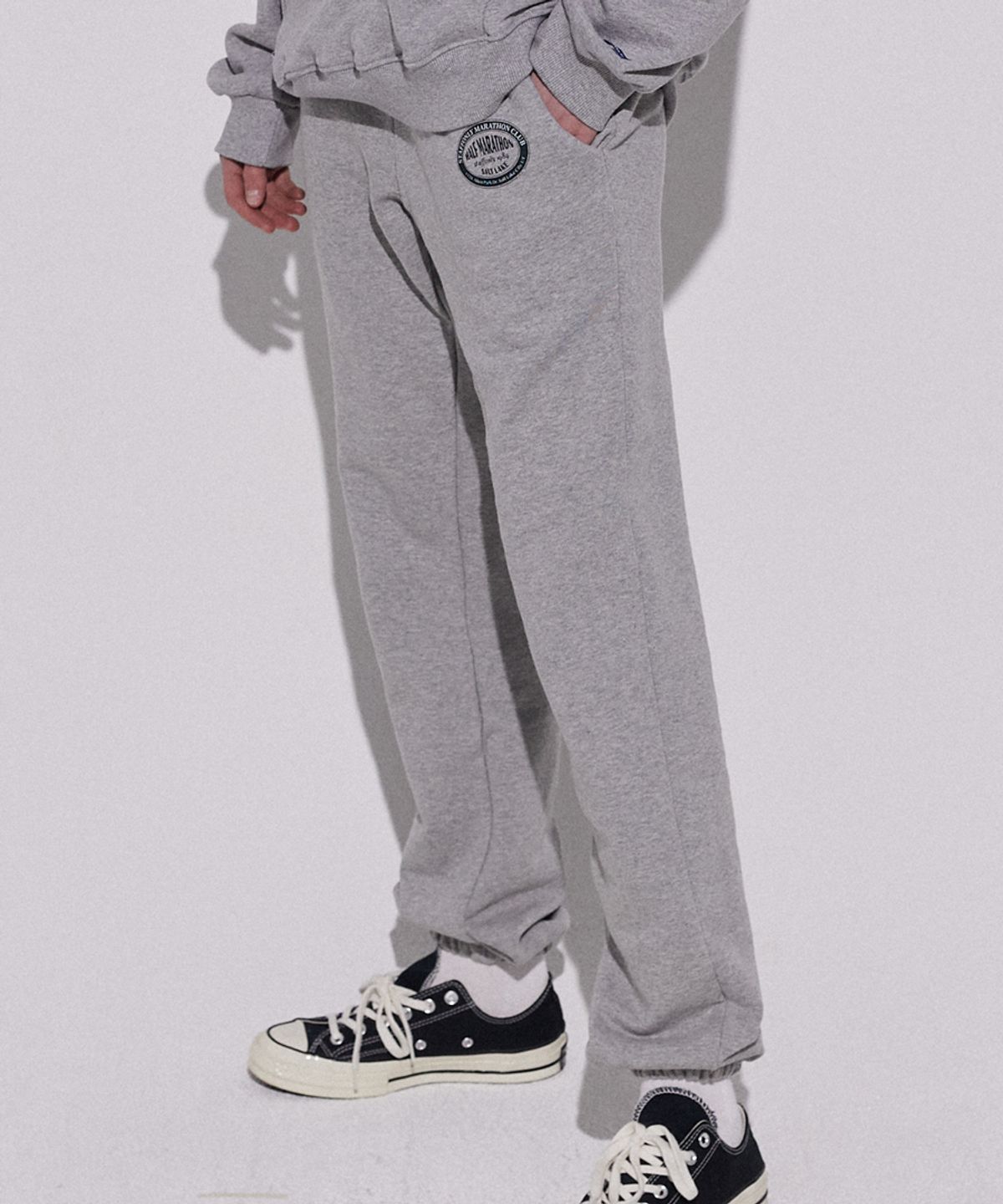 스텝온리(STAFFONLY) CIRCLE SWEATPANTS (MELANGE GREY)