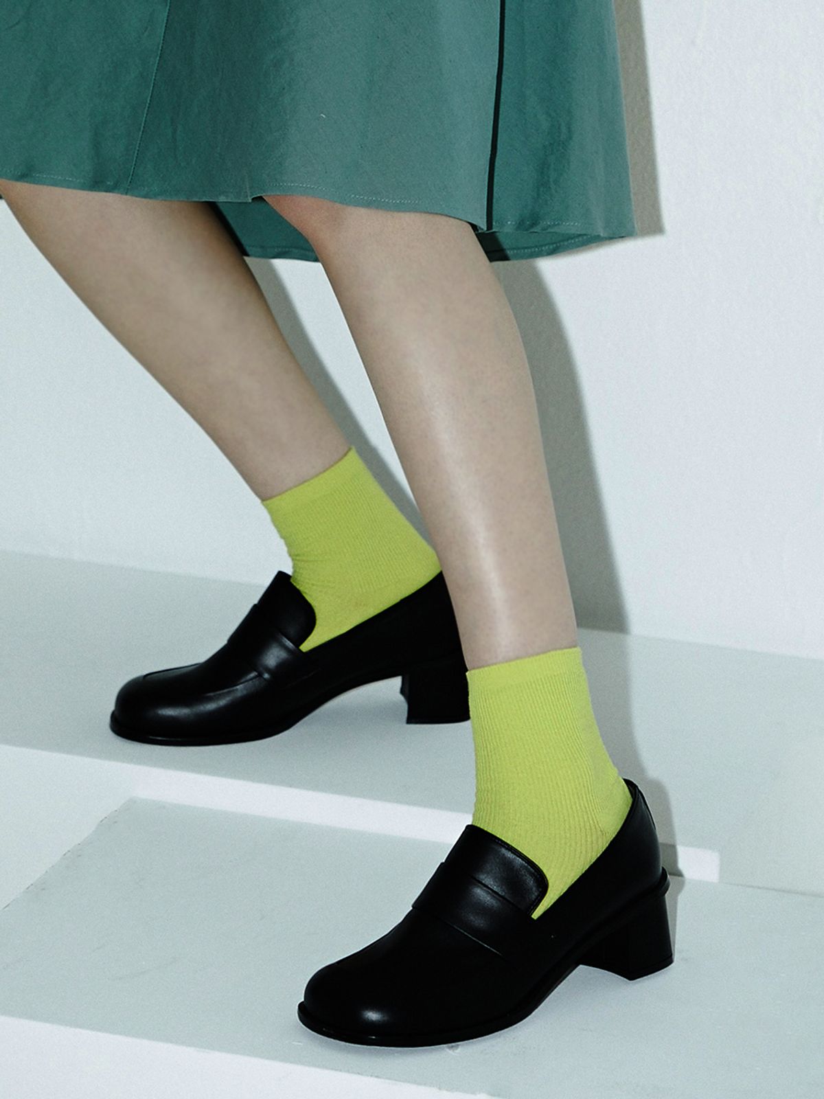 트레텐(TRETEN) Heeled Penny Loafers