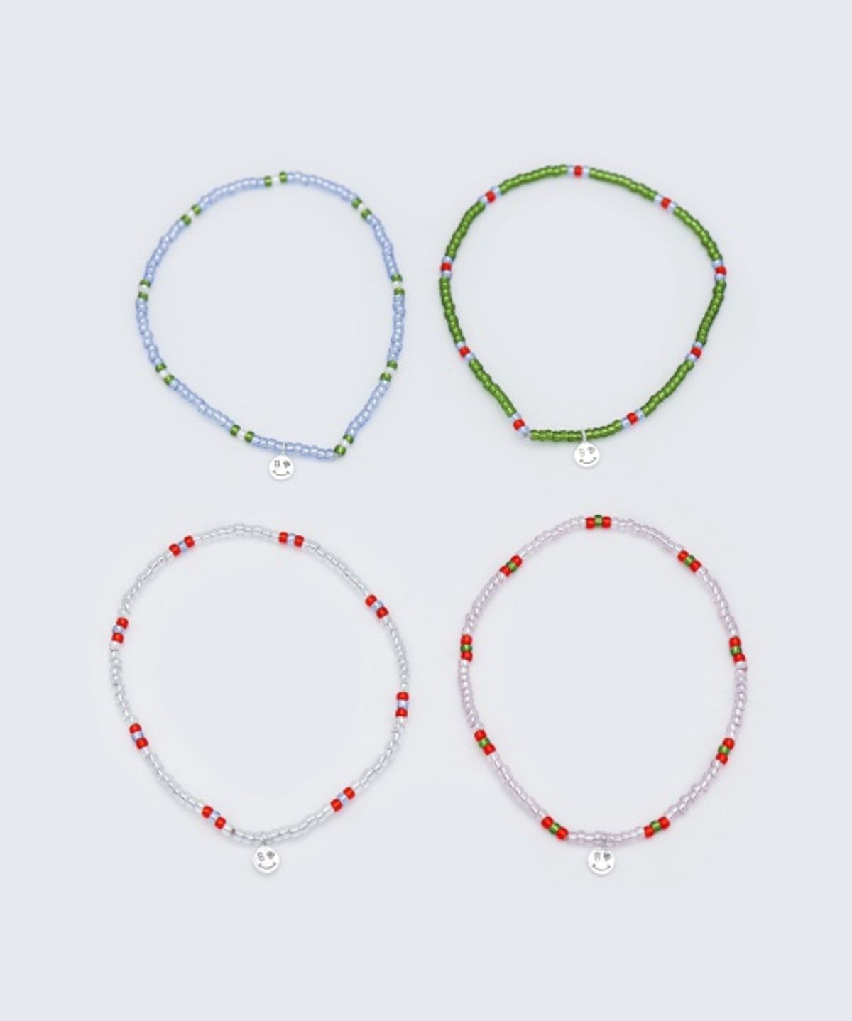 봉보(BONBEAU) Mini smile charm clear color beads Bracelet 미니 스마일 참 투명 컬러 비즈 팔찌
