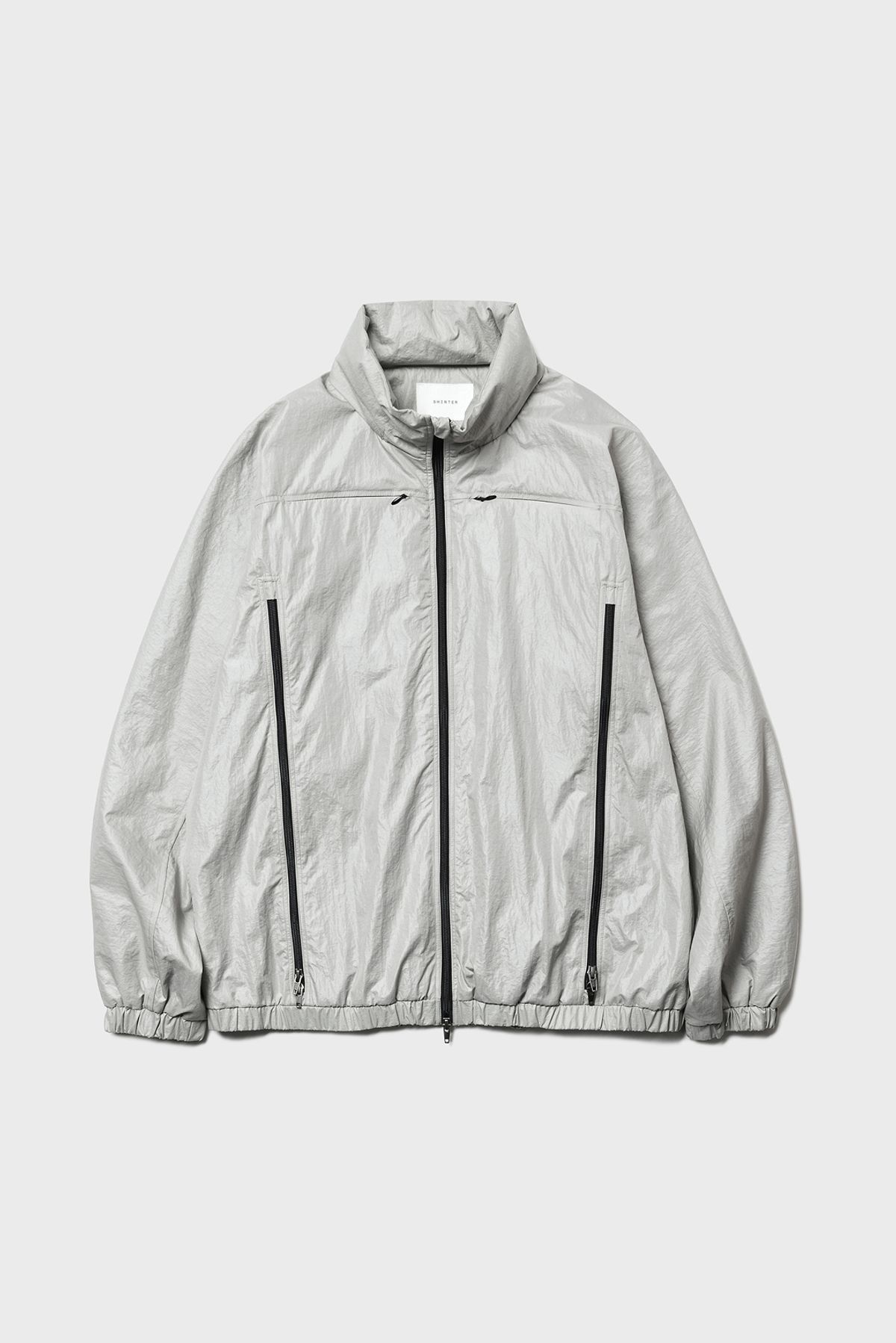 셔터(SHIRTER) COATED WINDBREAKER JACKET (LIGHT GREY)