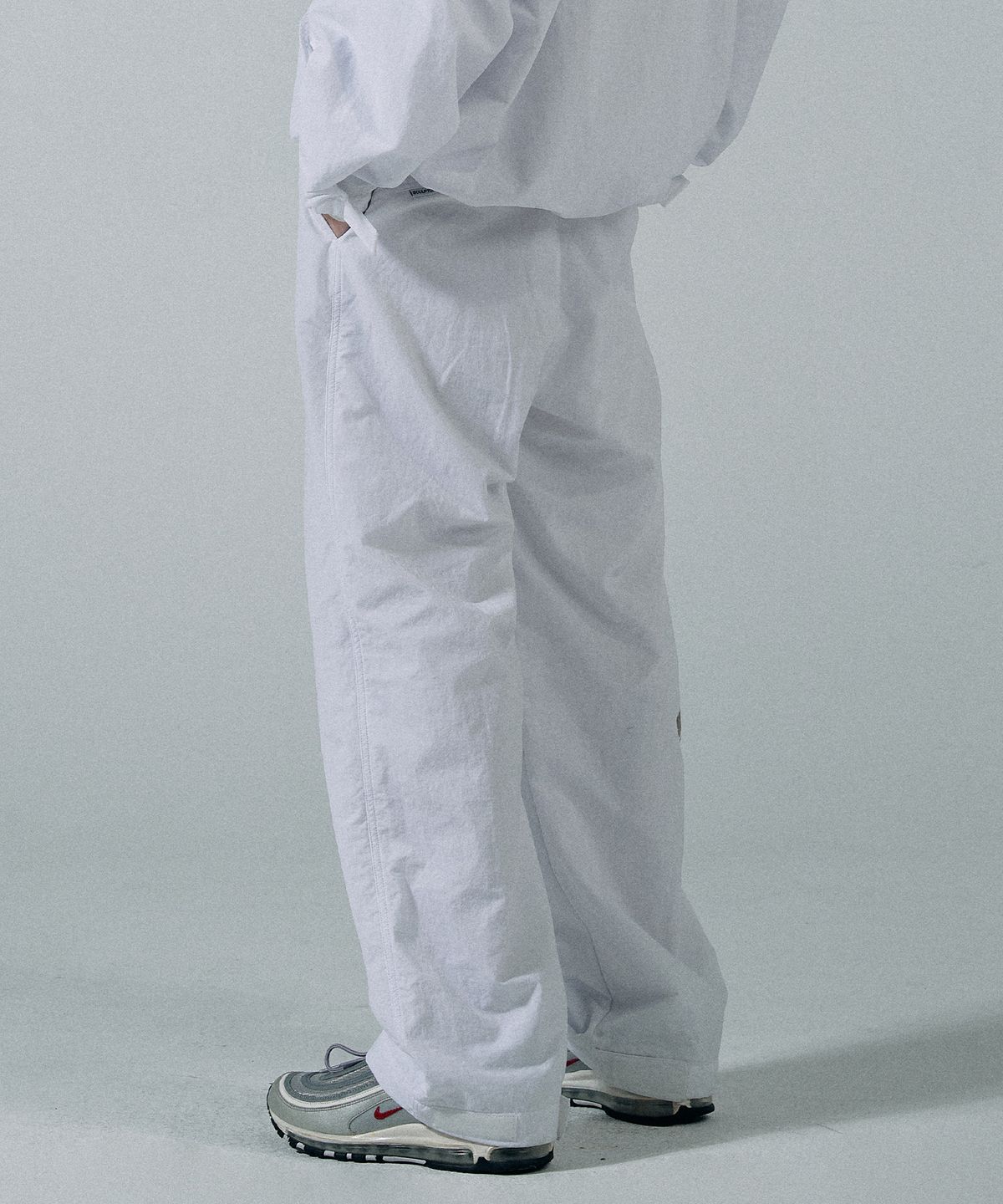 스컬프터(SCULPTOR) Two-Way Wind Pants White