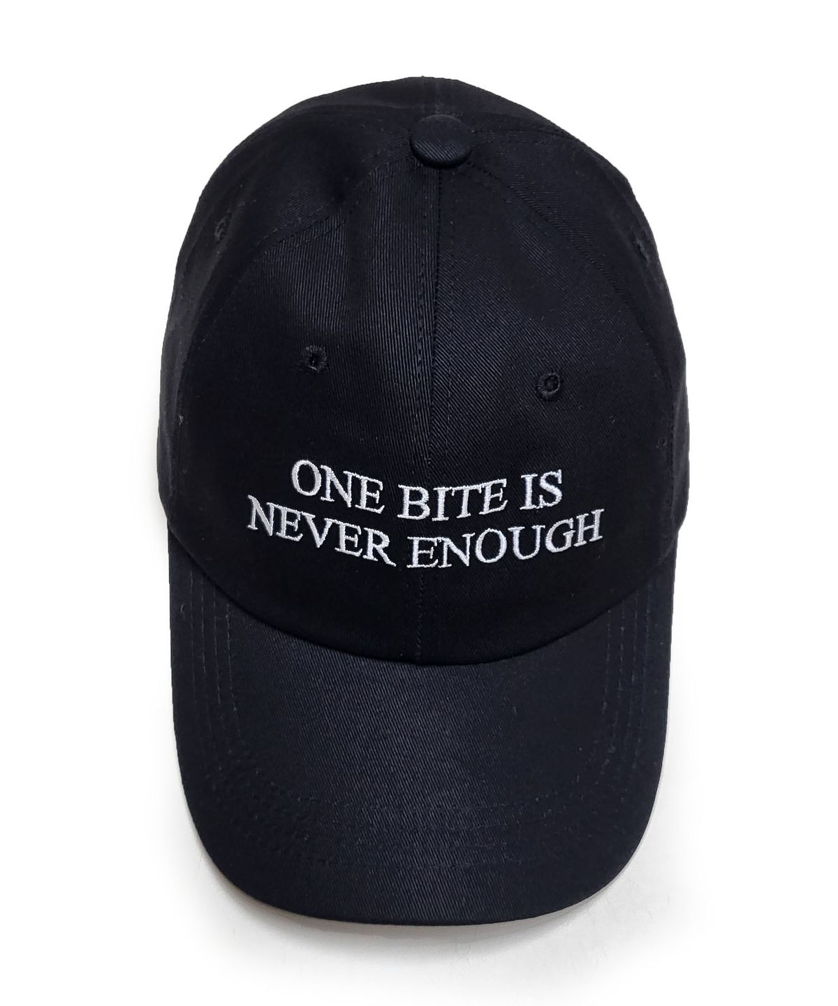 오바인(OBINE) ONE BITE IS NEVER ENOUGH 레터링 소프트 볼캡 블랙