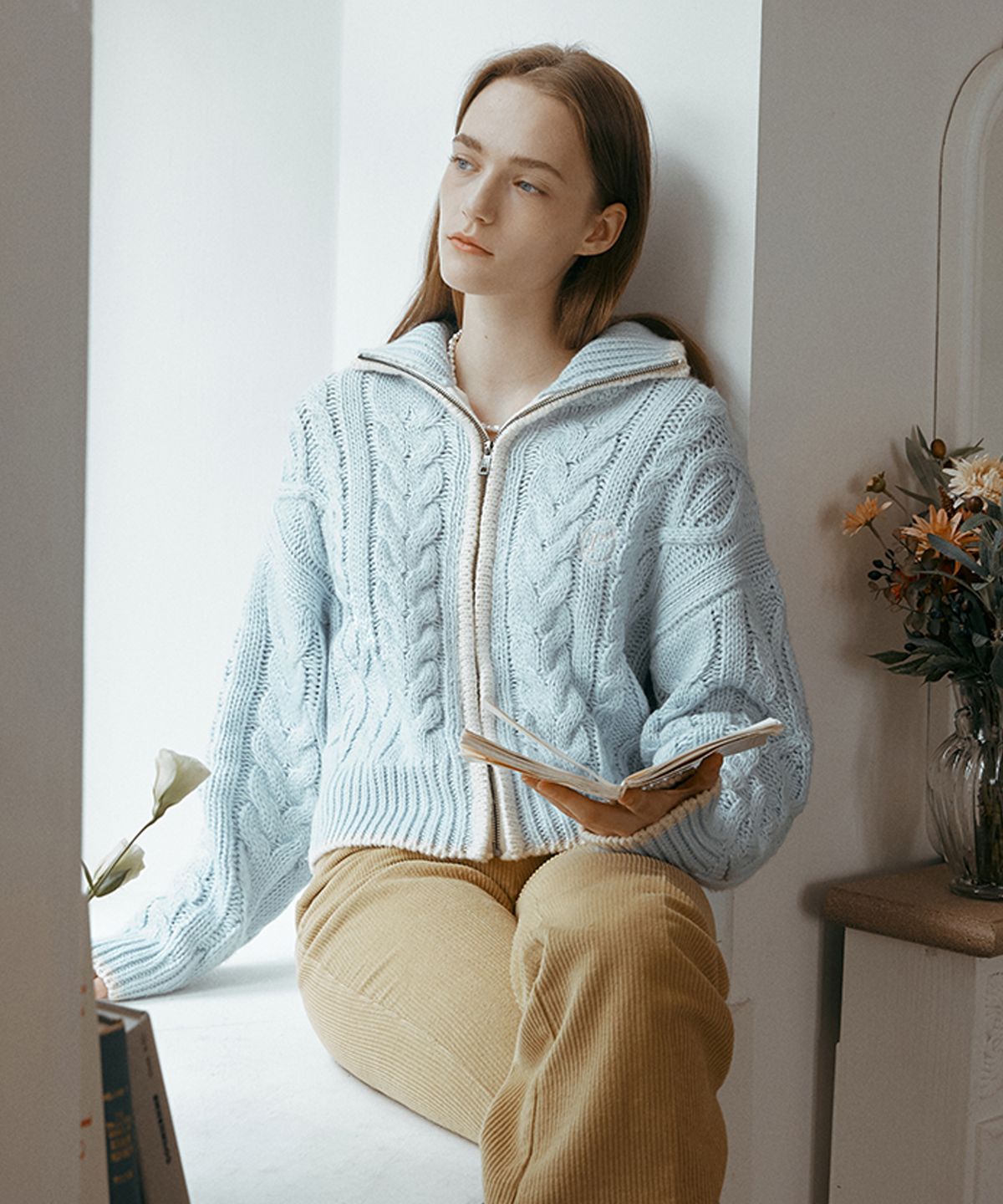 로라로라(ROLAROLA) TWOWAY CABLE ZIPUP KNIT LIGHT BLUE