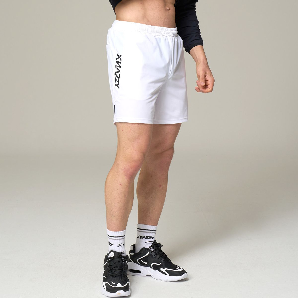 엑스네지(XNAZZY) 엑티브 3부 숏팬츠 XN22FWRSPT04 [WHITE]
