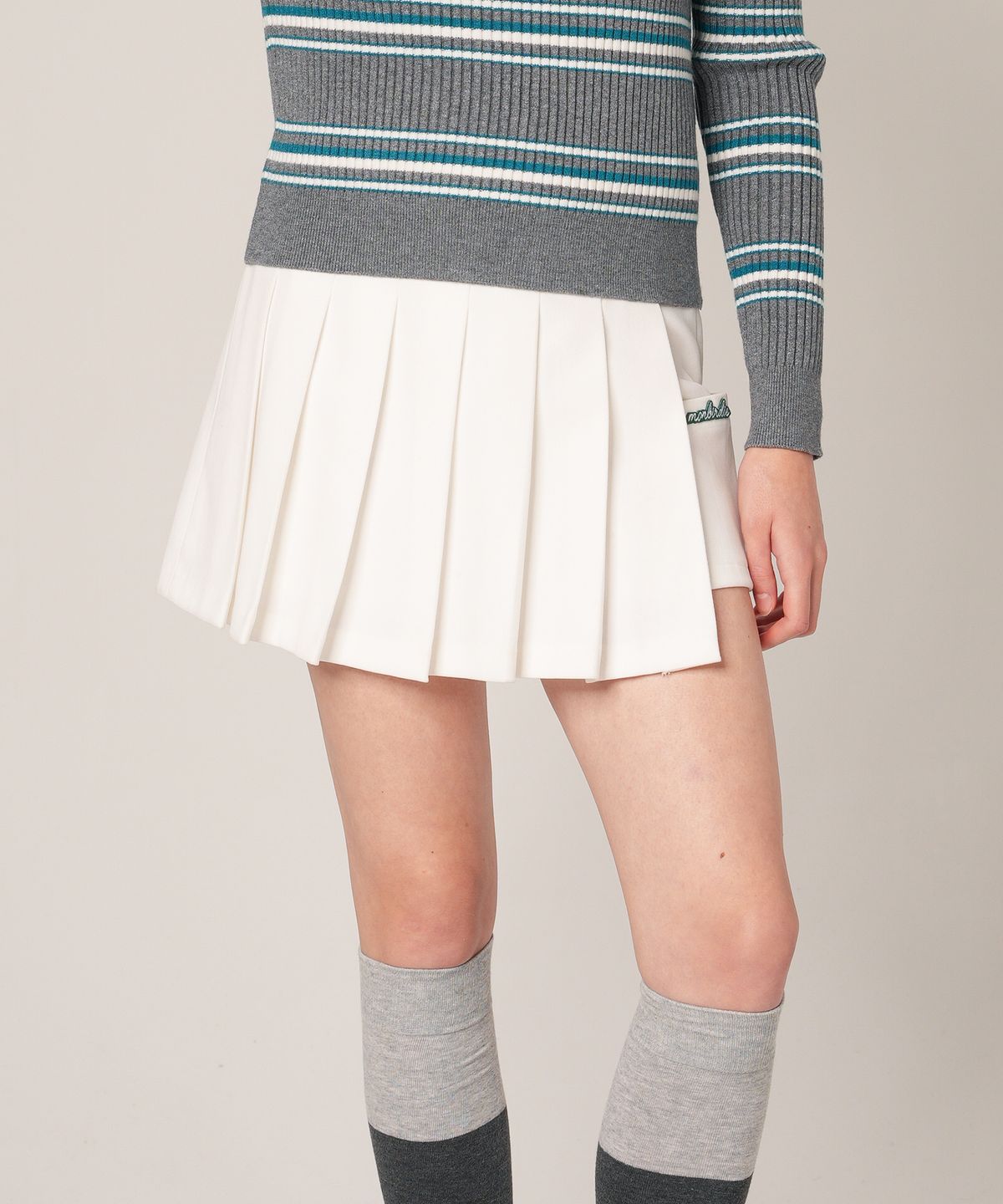 몽버디 골프(MONBIRDIE GOLF) Warm Pocket Pleats 피치기모 포켓 주름스커트 WHITE