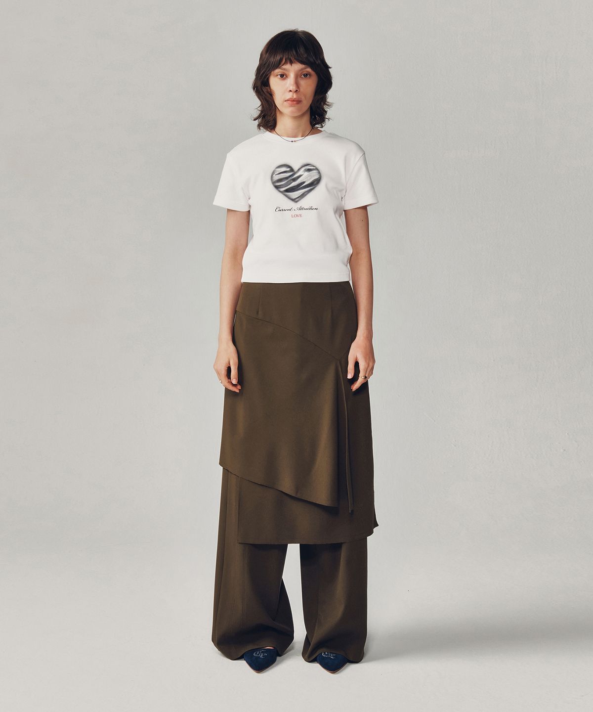 커렌트(CURRENT) ASSYMETRIC WRAP MIDI SKIRT [BRWON]