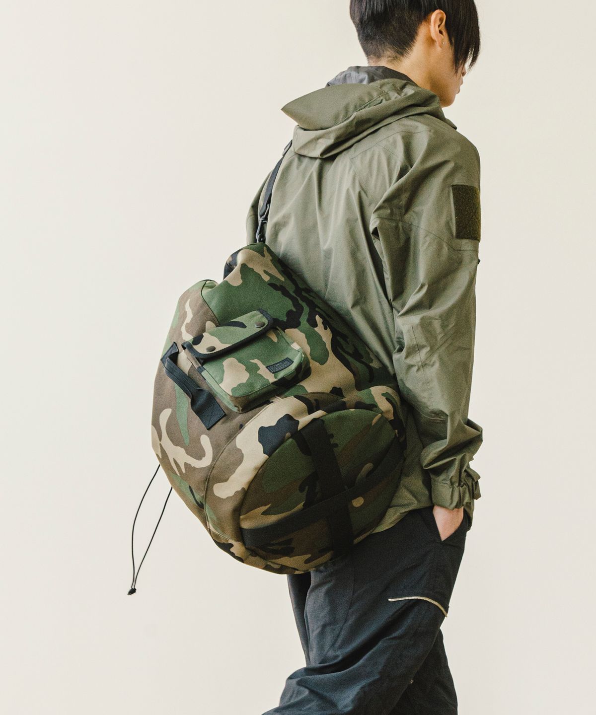 디얼스(THE EARTH) CORDURA String Sling Bag - WOODLAND