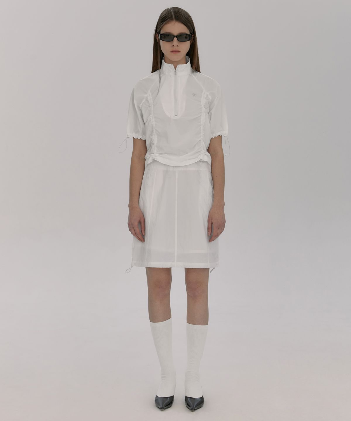 오아이오아이 컬렉션(OIOI COLLECTION) STRING SHEER SKIRT [WHITE]