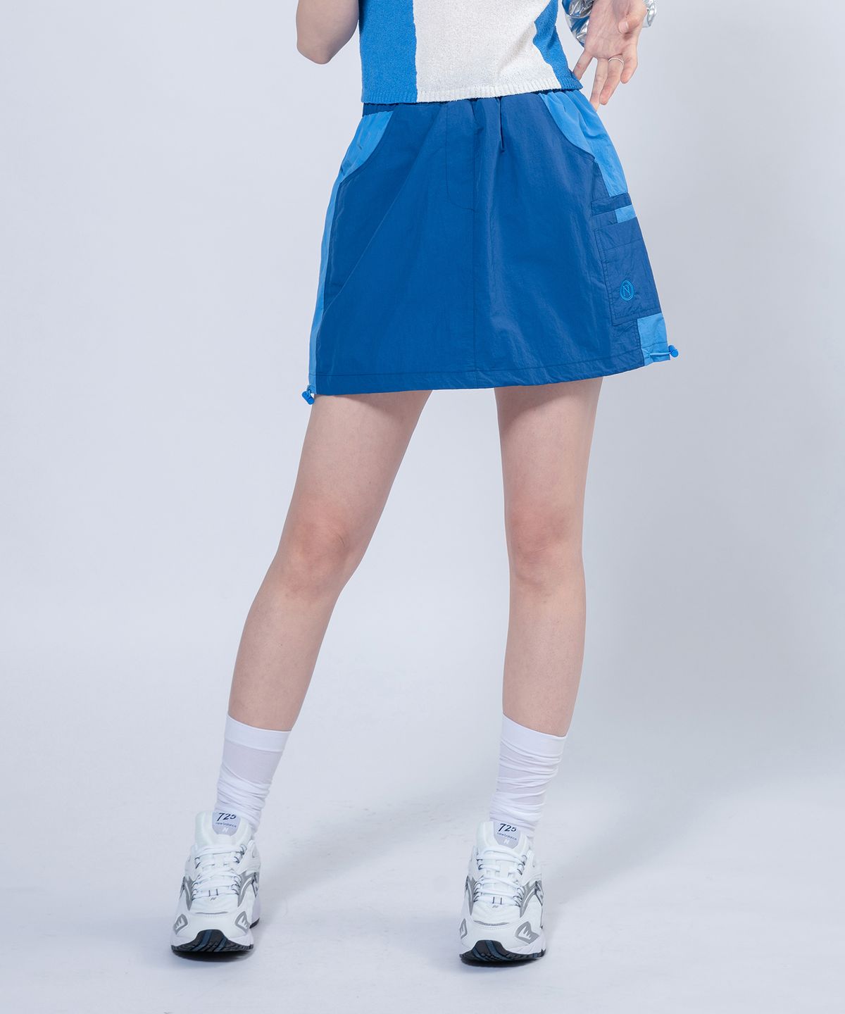 언유주얼 노말(UNUSUALNORMAL) WINDY SYMBOL SKIRT _ BLUE