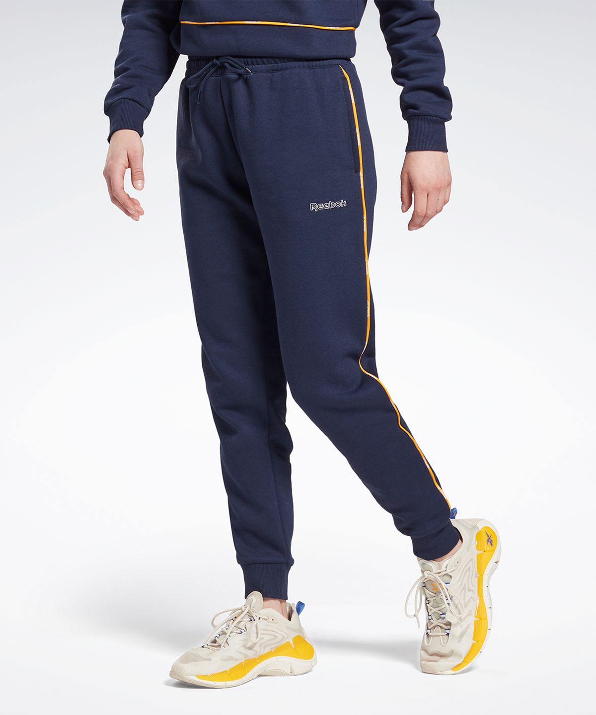 리복(REEBOK) Piping Pack 팬츠 - 네이비 / GS9327