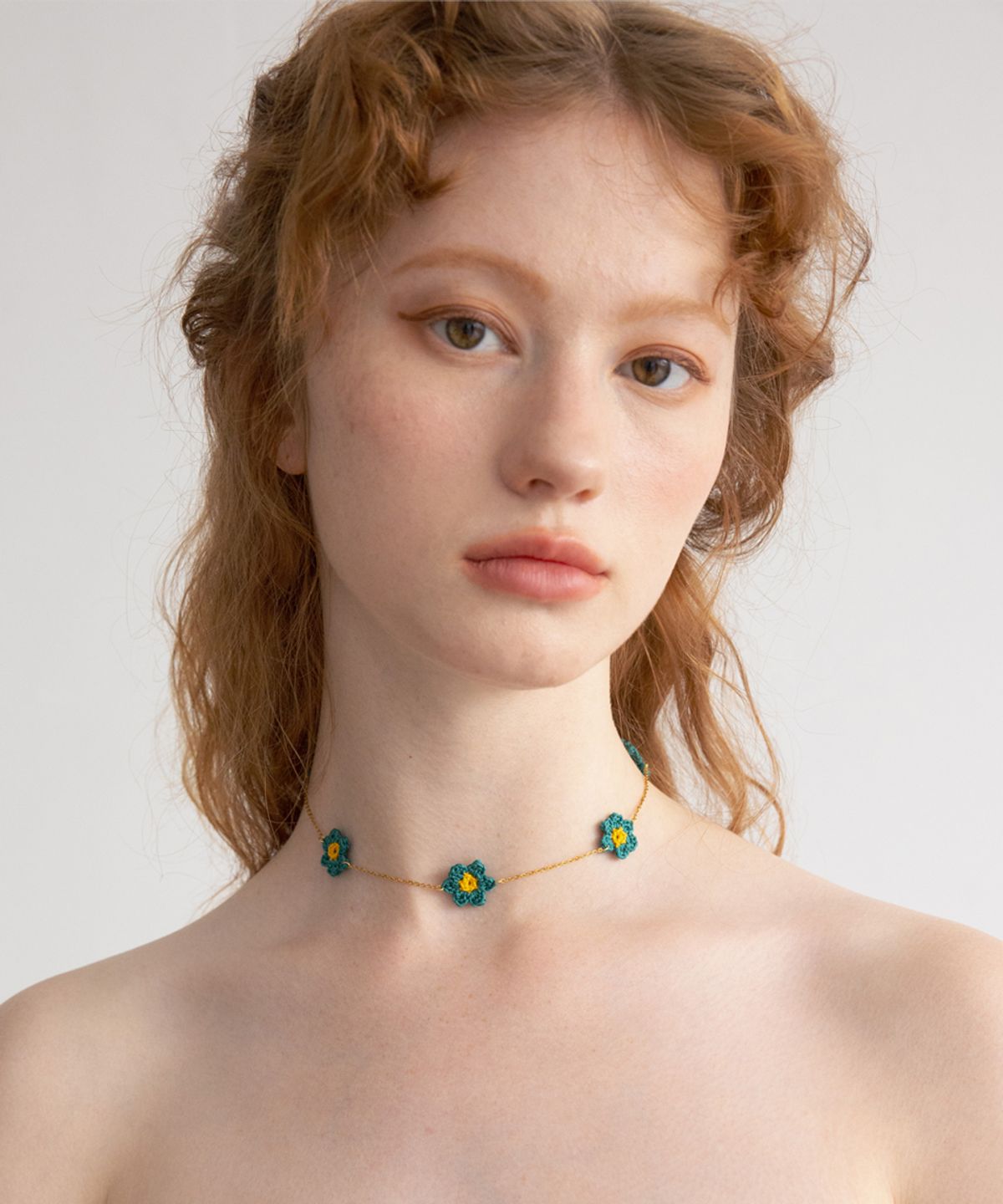 메리모티브(MERRYMOTIVE) Bluegreen flower point surgical necklace