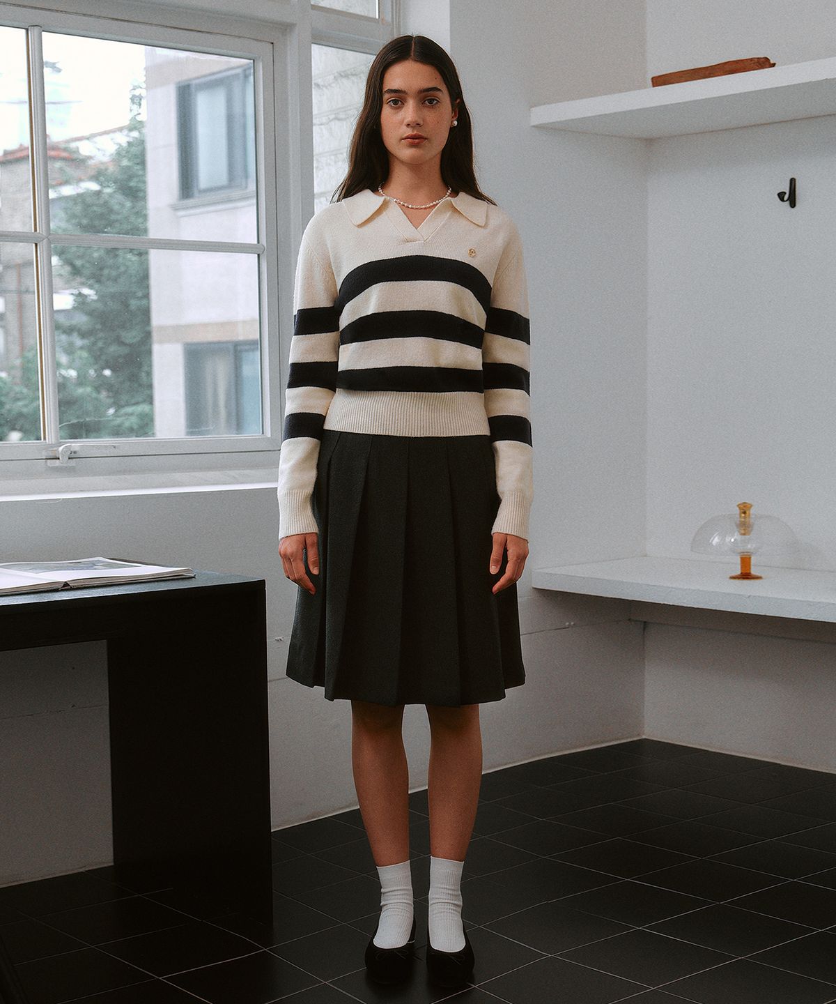 로라로라(ROLAROLA) WOOL BLENDED BUCKLE PLEATS SKIRT CHARCOAL